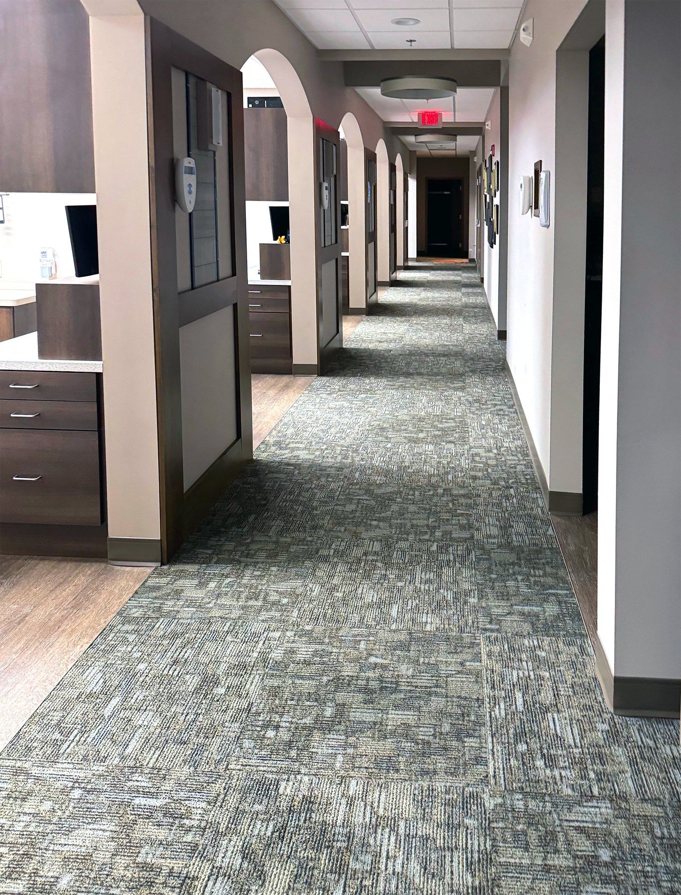 Freshly vacuumed commercial hallway in an office building cleaned by Solutions Cleaning